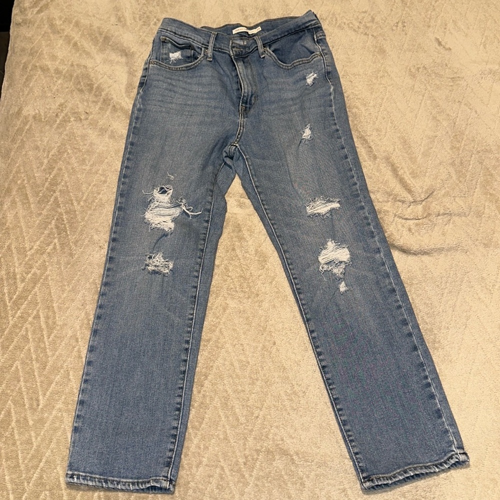 LEVIS JEANS - 724 High Rise Straight - Size 29 with distressed detail on legs